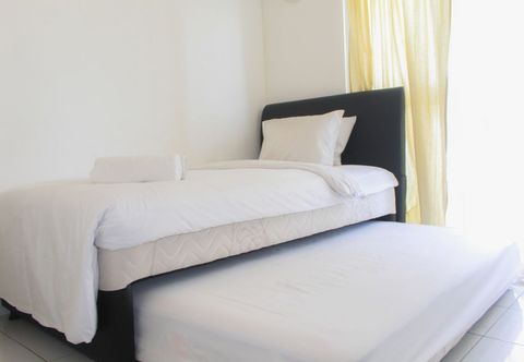 Bedroom Simply Minimalist Studio Apartment at Casa De Parco By Travelio
