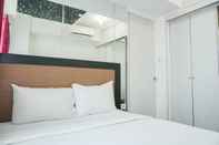 Bedroom Cozy Living 1BR Apartment at Pakubuwono Terrace By Travelio