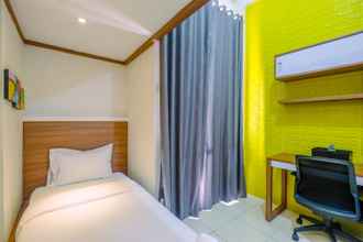 Bedroom 4 Cozy Living Studio at Dave Apartment near UI By Travelio