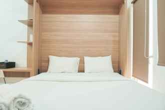 Bedroom 4 Strategic and Lovely Studio at Green Pramuka Apartment By Travelio