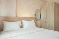 Kamar Tidur Comfort 2BR Green Pramuka City Apartment By Travelio