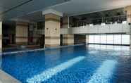 Swimming Pool 4 Gorgeous 2BR Apartment at Maqna Residence By Travelio