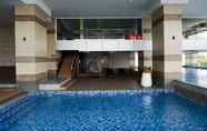 Swimming Pool 5 Gorgeous 2BR Apartment at Maqna Residence By Travelio