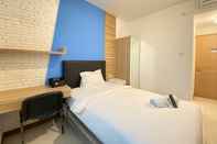 Kamar Tidur Smart Studio Semi Apartment at The Lodge Paskal near BINUS University By Travelio