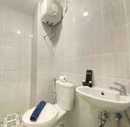 In-room Bathroom 4 Smart Studio Semi Apartment at The Lodge Paskal near BINUS University By Travelio