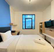 Bedroom 2 Simply Studio Semi Apartment at The Lodge Paskal near BINUS University By Travelio