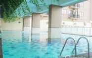 Swimming Pool 5 Near Metro Indah Mall 1BR at Tamansari Panoramic Apartment By Travelio