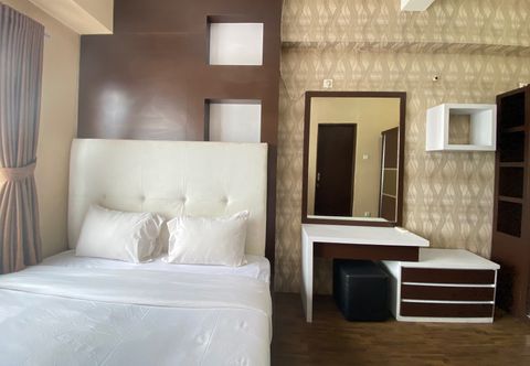 卧室 Near Metro Indah Mall 1BR at Tamansari Panoramic Apartment By Travelio