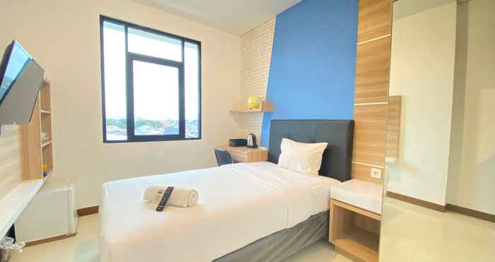 Kamar Tidur Comfortable Studio Semi Apartment near BINUS University at The Lodge Paskal By Travelio