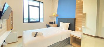 Lobby 2 Comfortable Studio Semi Apartment near BINUS University at The Lodge Paskal By Travelio
