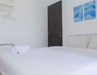 Bedroom 2 Comfortable and Relaxing 2BR at Emerald Bintaro Apartment By Travelio