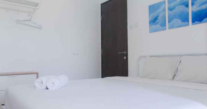 Bedroom Comfortable and Relaxing 2BR at Emerald Bintaro Apartment By Travelio