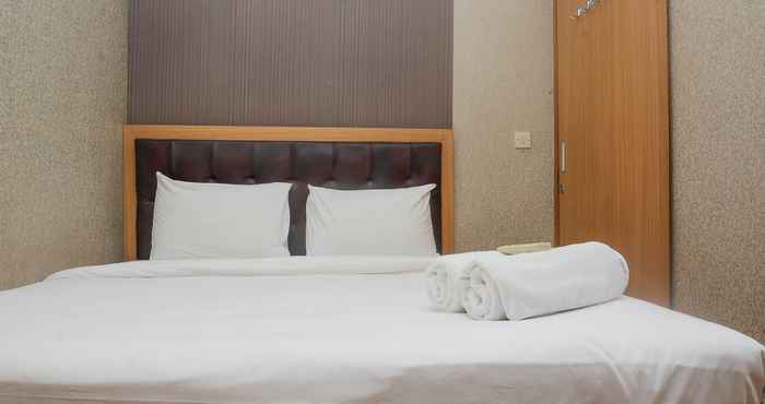 Bedroom Relaxing and Comfy 2BR at Menteng Square Apartment By Travelio
