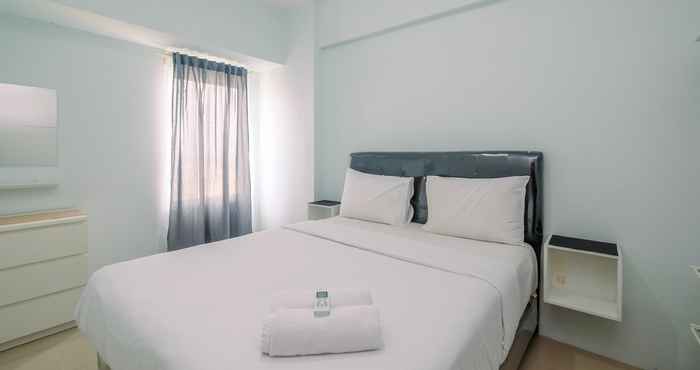 Kamar Tidur Cozy Stay 2BR Apartment at Tamansari Mahogany By Travelio