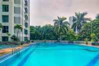 Swimming Pool Strategic and Spacious 3BR Kondominium Juanda Apartment By Travelio