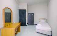 Bedroom 2 Spacious and Homey 3BR Kondominium Juanda Apartment By Travelio