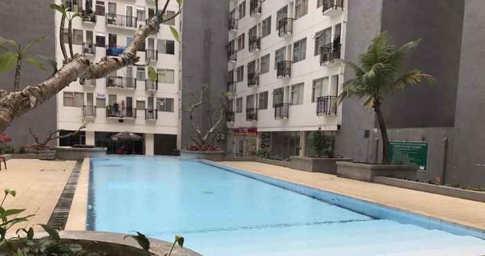 Kolam Renang Homey and Relaxing 3BR Apartment at The Jarrdin Cihampelas By Travelio