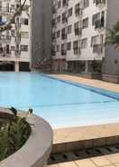 SWIMMING_POOL Homey and Relaxing 3BR Apartment at The Jarrdin Cihampelas By Travelio