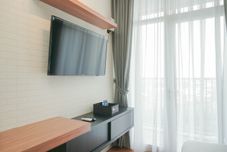 Common Space Comfortable and Fully Furnished Studio at Ciputra International Apartment By Travelio
