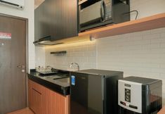 Common Space 3 Comfortable and Fully Furnished Studio at Ciputra International Apartment By Travelio