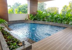 Swimming Pool 7 Luxurious Studio Apartment at Capitol Suites By Travelio
