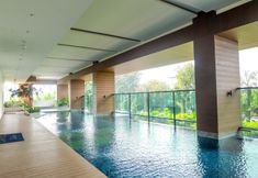 Swimming Pool 5 Luxurious Studio Apartment at Capitol Suites By Travelio