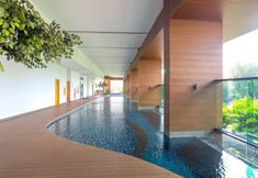 Swimming Pool 6 Luxurious Studio Apartment at Capitol Suites By Travelio