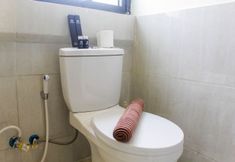 In-room Bathroom 3 Enjoy and Homey 2BR at Meikarta Apartment By Travelio