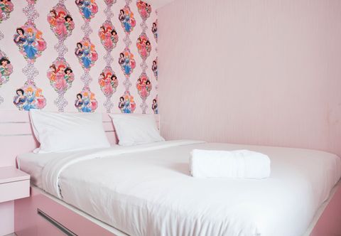 Bedroom Fresh and Homey 2BR Green Pramuka Apartment By Travelio