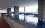 Swimming Pool 4 Fully Furnished & Cozy Studio Poris 88 Apartment By Travelio