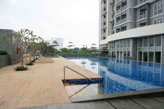Swimming Pool 4 2BR Luxury and Modern at Ciputra International Apartment By Travelio