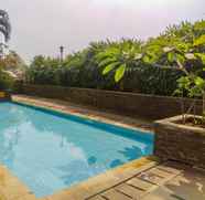 Swimming Pool 3 Simply and Comfy Studio Apartment at Margonda Residences 3 By Travelio