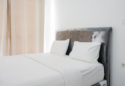 Bedroom Modern and Comfort 1BR Casa De Parco Apartment By Travelio