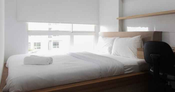 Kamar Tidur New and Cozy Living 1BR Apartment at Scientia Residences By Travelio