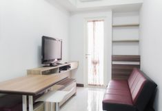 Lobby 2 New and Cozy Living 1BR Apartment at Scientia Residences By Travelio