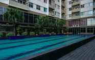 Swimming Pool 4 Modern Simply Studio Apartment at Centro City Residence By Travelio