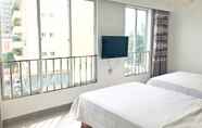 Kamar Tidur 4 White Palace 2 Hotel