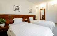 Kamar Tidur 3 White Palace 2 Hotel