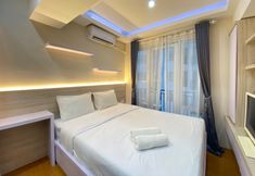 Phòng ngủ 2 Stylish and Wonderful Studio at Jarrdin Cihampelas Apartment By Travelio