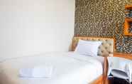 Bedroom 3 Spacious & Strategic 3BR Apartment at Trillium Residence By Travelio