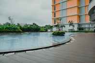 Swimming Pool Homey and New Furnish 1BR Apartment at Pejaten Park Residence By Travelio