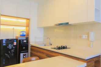 Common Space 4 Super Comfy & Brand New 1BR Marigold Nava Park Apartment By Travelio