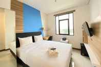 Bedroom Cozy Studio near 23 Paskal at The Lodge Paskal Apartment By Travelio