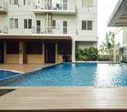 Swimming Pool 4 Best Choice and Cozy Studio at Bogor Icon Apartment By Travelio