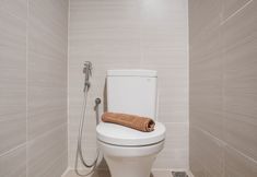 In-room Bathroom 4 Modern and Comfort Studio at West Vista Apartment By Travelio