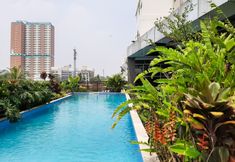 Swimming Pool 6 Cozy and Minimalist Studio Apartment at Tuscany Residences By Travelio
