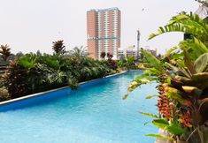 Swimming Pool 4 Cozy and Minimalist Studio Apartment at Tuscany Residences By Travelio