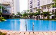 Swimming Pool 5 Cozy 1BR Apartment at Scientia Residence By Travelio