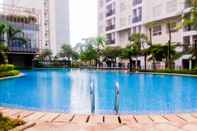 Swimming Pool Cozy 1BR Apartment at Scientia Residence By Travelio