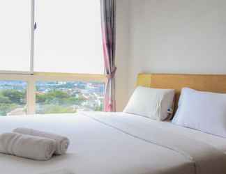 Bedroom 2 Cozy 1BR Apartment at Scientia Residence By Travelio